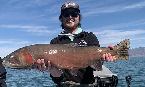 Kody with an enormous Pyramid Lake cutthroat trout.